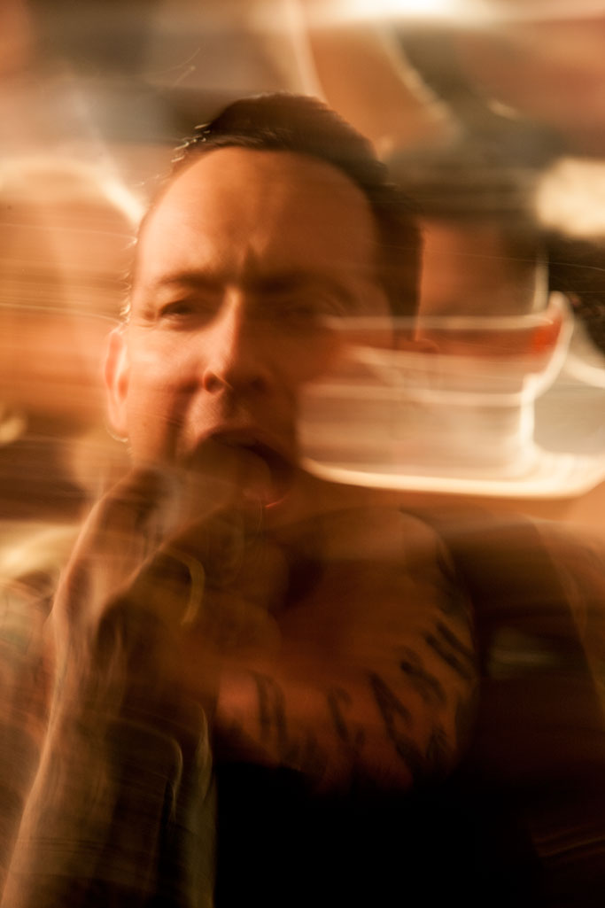 Portrait of the Lead singer of Volbeat (music band) while making a video in cooperation with the band The Strom